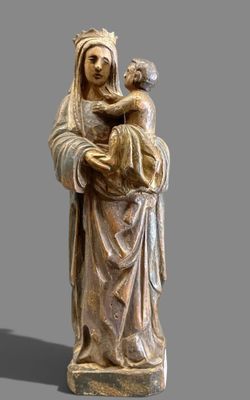 an image of a statue of a woman holding a child