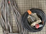 a cable that is laying on the floor next to a wire