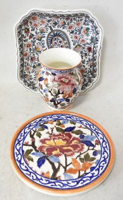 a plate with a cup on it next to a plate with a bowl on it