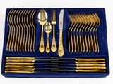 a blue box with a set of silverware in it