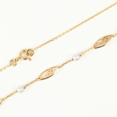 Collier en or orné de maillons filigranés alternés de 9 perl… - Photo 1