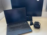 two laptops are sitting on a desk next to a monitor and mouse
