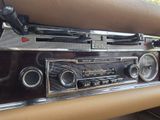 a radio in the center of a car that is in a car