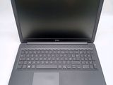 the dell laptop is open and ready to be used