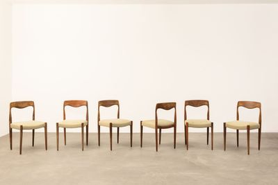 set of six dining chairs in the style of person