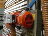 a machine that has a blower attached to it ' s side