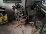 a small machine that is sitting in the corner of a room