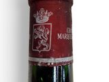 a bottle of wine that is sitting on a table