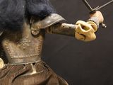 an image of a statue of a man with a sword