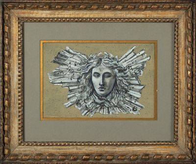 une image représentant un tableau représentant le visage d'un homme dans un cadre doré