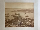 an old photo of a harbor with ships in the water
