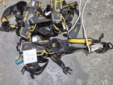 a bunch of black and yellow items on the ground