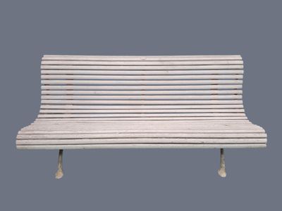 a white bench that is sitting on a blue background