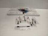 a lot of pens and a pen on the table