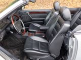 a picture of the interior of a car with leather seats