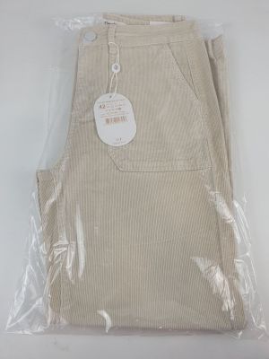 the back of a pair of beige pants with a tag on it