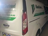 a white van that is parked in a garage