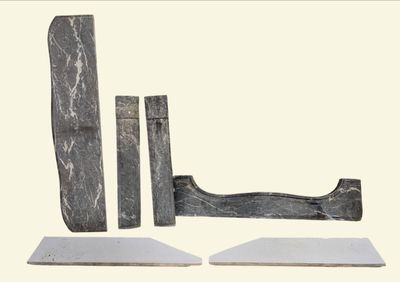two pieces of marble sitting on top of each other