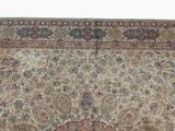 an antique persian rug with a floral design on a white background