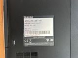 a close up of a laptop with a sticker on it