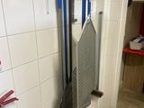 an image of a kitchen with a fire extinguisher and a fire extinguisher on the wall