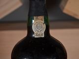a bottle of wine that is sitting on a table