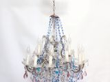 a chandelier that is hanging from a wire