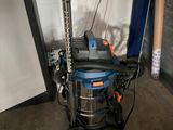 an image of a vacuum cleaner in a garage