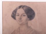 portrait of a woman in a brown dress with a necklace and earrings
