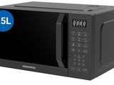 a black microwave oven sitting on top of a white counter