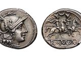 a silver coin with an image of a man on a horse