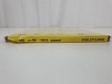 a yellow book sitting on top of a white table