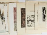 a lot of papers that are hanging on the wall