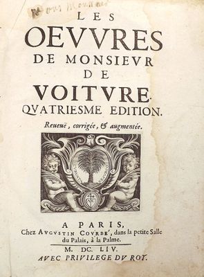 an old book with a black and white image of a bird on it