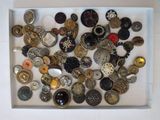 a white box filled with lots of buttons and buttons