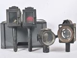 three different types of cameras sitting next to each other