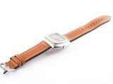 an image of a watch on a white surface with a brown strap