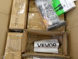 many boxes of electronic devices in a box on the floor