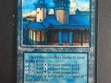 a close up of a card with a picture of a building
