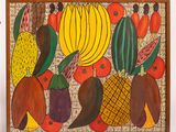a picture of a painting of fruit and vegetables on the wall