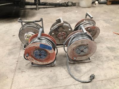 a lot of hoses that are sitting on the floor