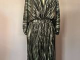 a black and silver dress on a mannequin mannequin mannequin mannequin mannequin mannequin mannequin mannequin mann