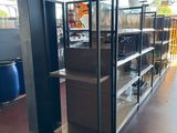 a large room with shelves and bins in it