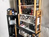 a shelf with many items on it in a room