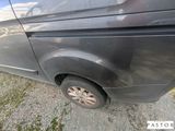 a black van parked on the side of the road