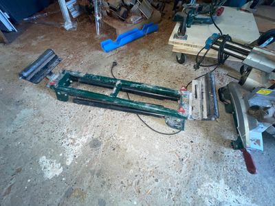 a picture of a room with a lot of tools on the floor