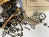 a pile of old keys and other items on a table