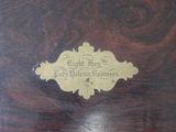 a close up of a wooden table with a label on it