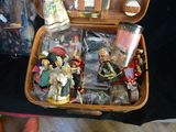 a suitcase full of toys sitting on top of a table