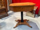 a small table with a wooden top on a stand